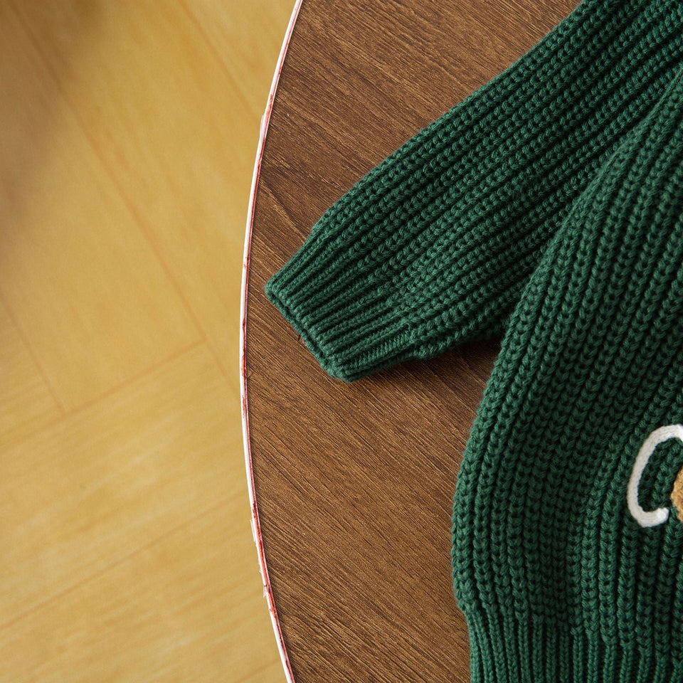 JoyKnit – Knus & Warm - Kersttrui met tekst